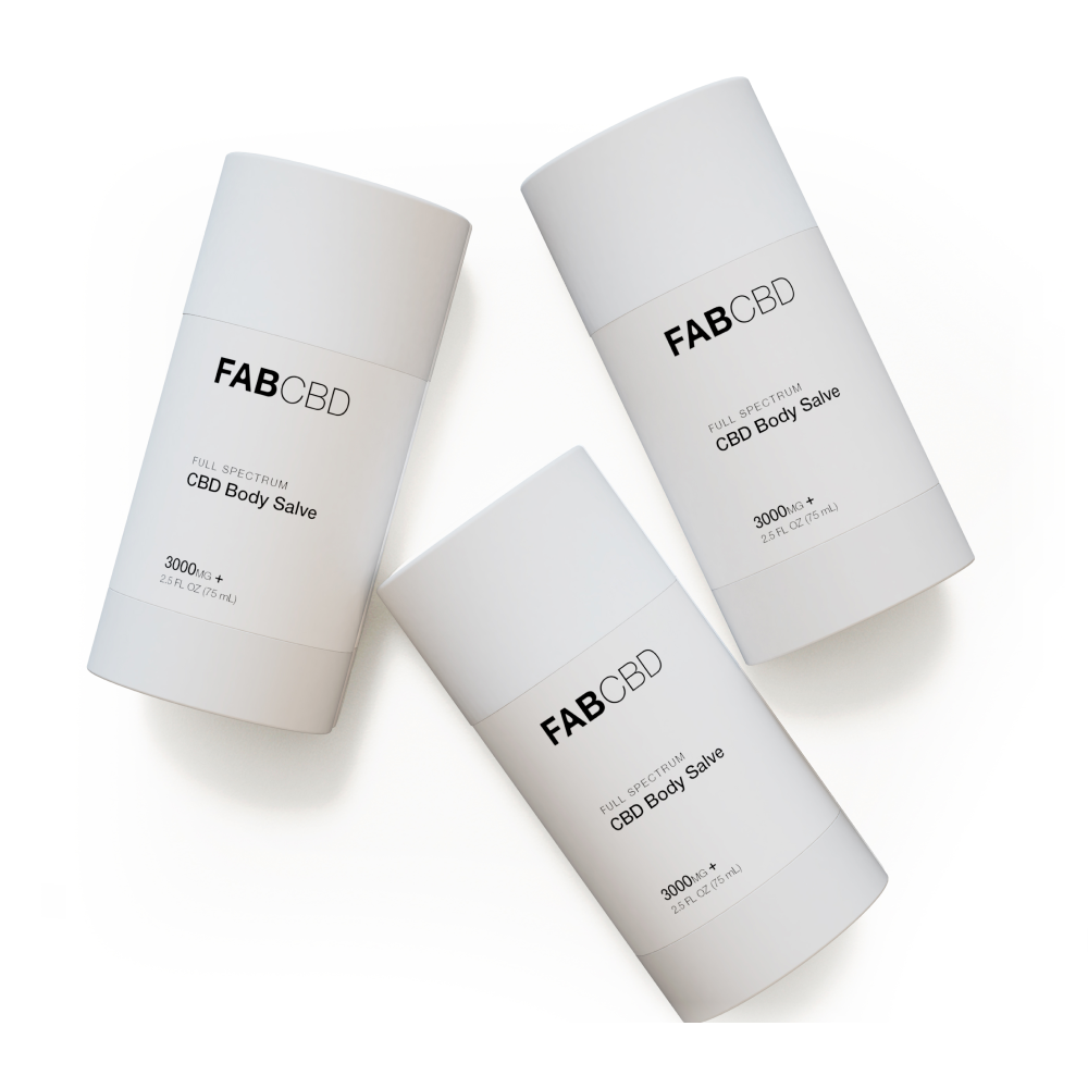 Three white cylindrical stick containers of FAB CBD Full Spectrum CBD Body Salve, each labeled '3000mg+, 2.5 FL OZ (75 mL),' arranged at angles on a white background.